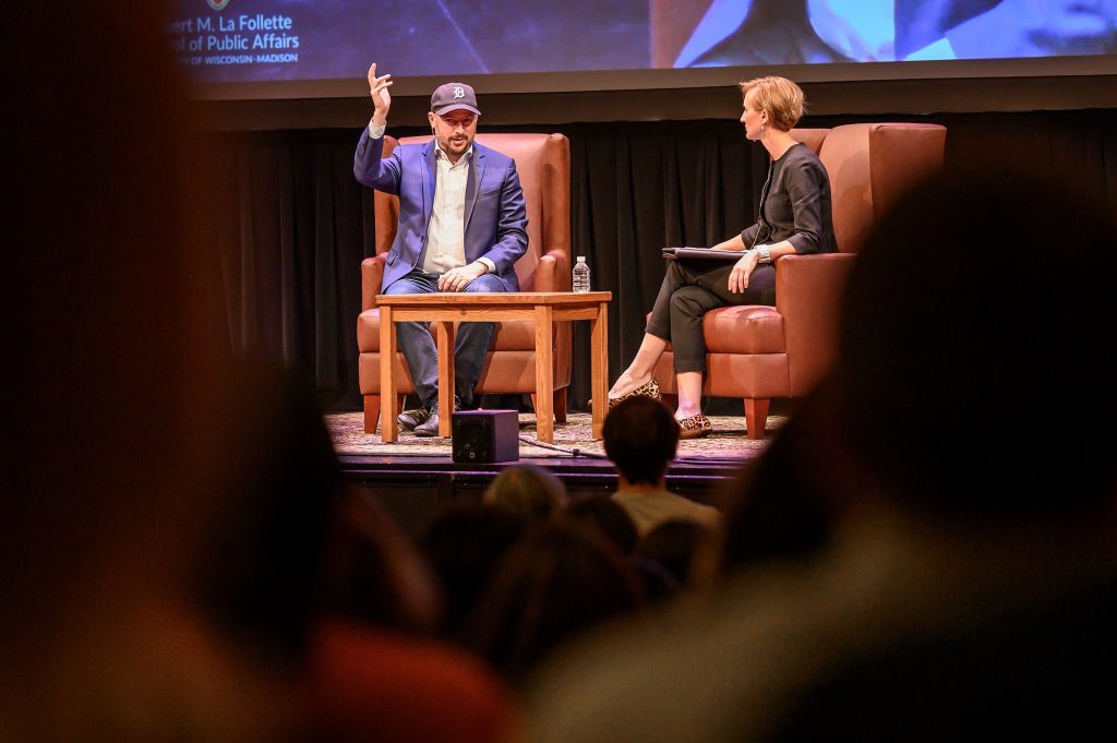 At left, Nate Silver, Public Affairs Journalist in Residence and founder and editor in chief of FiveThirtyEight, gestures as he answers audience questions posed to him by Susan Webb Yackee (at right), director of the La Follette School of Public Affairs, in Shannon Hall in the Wisconsin Union Theater at the University of Wisconsin–Madison on Oct. 26, 2022. The event, Politics & Policy with Nate Silver of FiveThirtyEight, is organized by the La Follette School of Public Affairs. (Photo by Althea Dotzour / UW–Madison)
