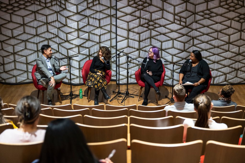 From left to right, Ramtin Arablouei and Rund Abdelfatah, co-hosts and co-producers of NPR’s podcast “Throughline” and UW–Madison’s fall Journalists in Residence, and Kacie Lucchini Butcher, director of UW–Madison’s Public History Project, engage in a public panel discussion moderated by Christy Clark-Pujara (at far left), a professor of history in UW–Madison’s Department of Afro-American Studies, during a Diversity Forum event held at the Chazen Museum of Art at the University of Wisconsin–Madison on Nov. 14, 2022. The museum is currently hosting the the public exhibit: Sifting & Reckoning: UW–Madison’s History of Exclusion and Resistance. (Photo by Jeff Miller / UW-Madison)