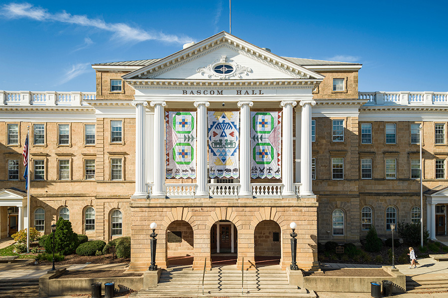 A view of the front facade of Bascom Hall on a sunny day.