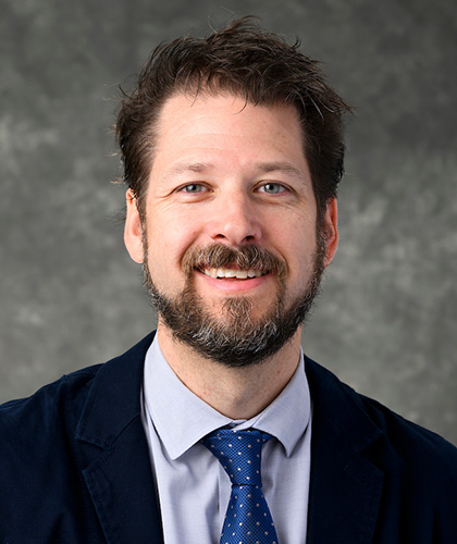 Headshot of John Lucas