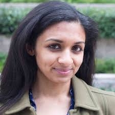 Headshot of Deepa Seetharaman. She has dark hair and is wearing an olive green collared jacket.